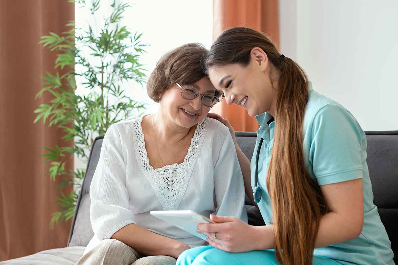 women-looking-tablet-medium-shot1